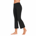 Pantaloni donna taglia S neri in tessuto elasticizzato a vita alta con gamba svasata